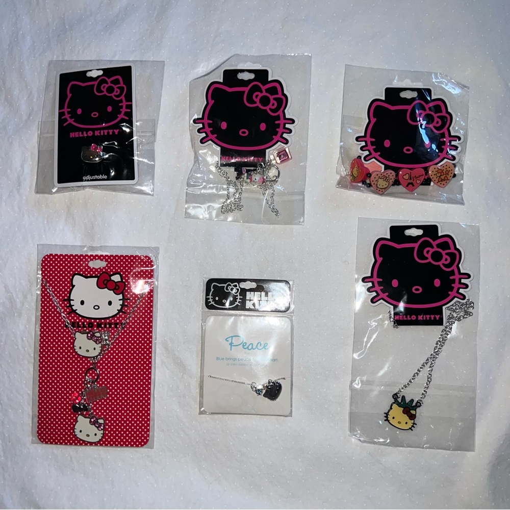 Hello Kitty Accessories Lot. Necklaces. Bracelet. Rings. New in package. 6 total